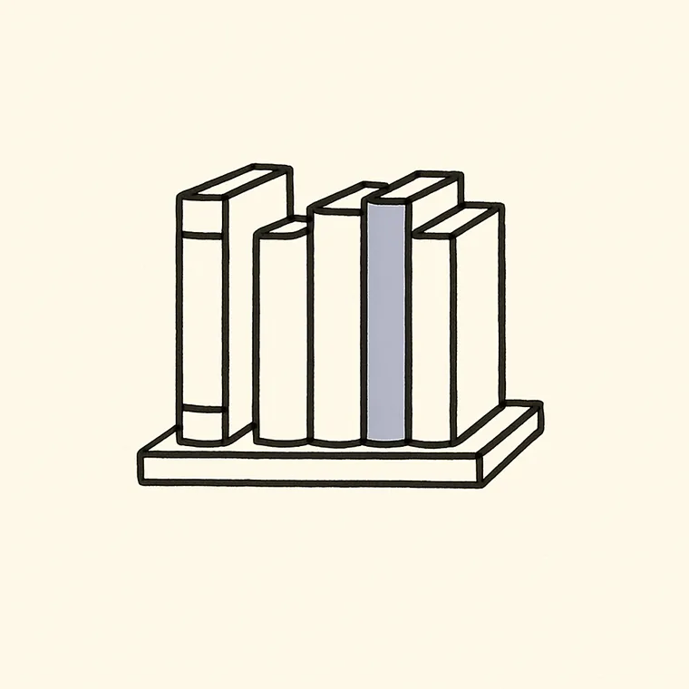 A shelf of six books of different heights