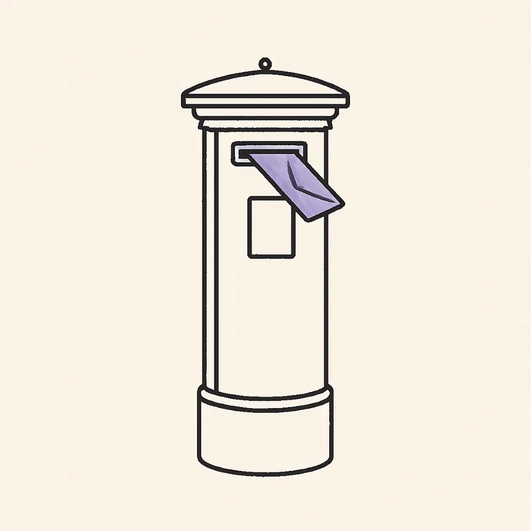 A pillar postbox with a letter half posted