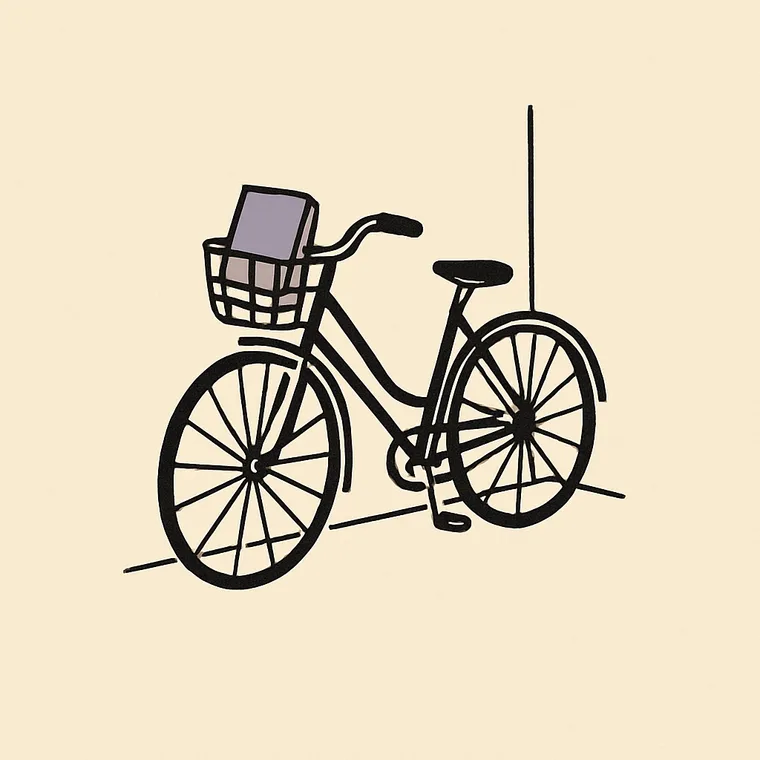 A bicycle with a book in its front basket